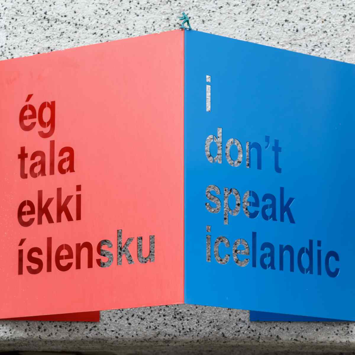 A creative bilingual sign in Iceland with 