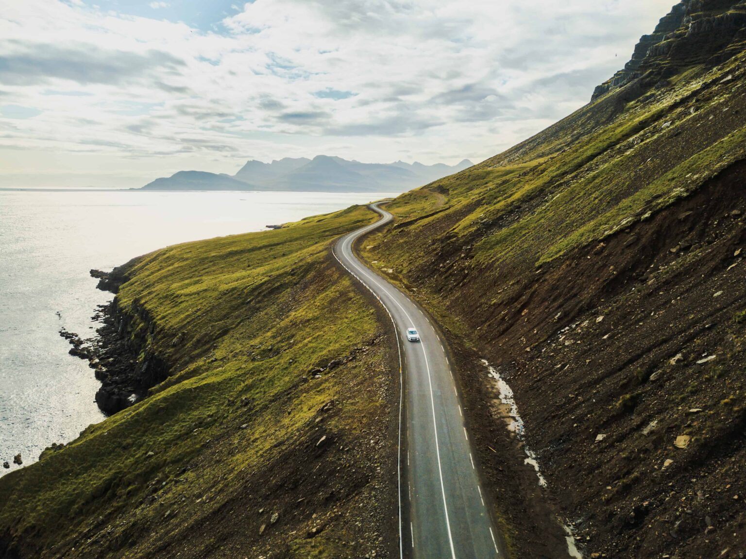 Scenic coastal road in Iceland, where the drive becomes the main event.