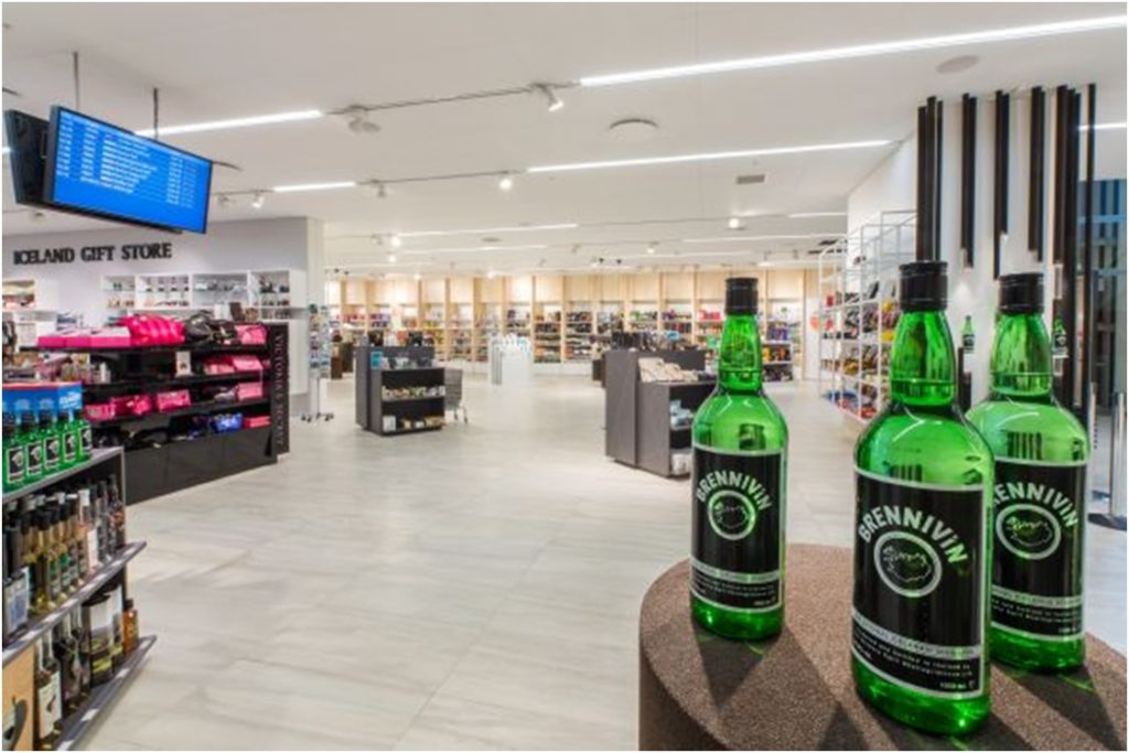 Green Brennivín bottles stand out in a bright Iceland duty free store, the perfect place to grab Iceland’s signature liquor before hitting the road.