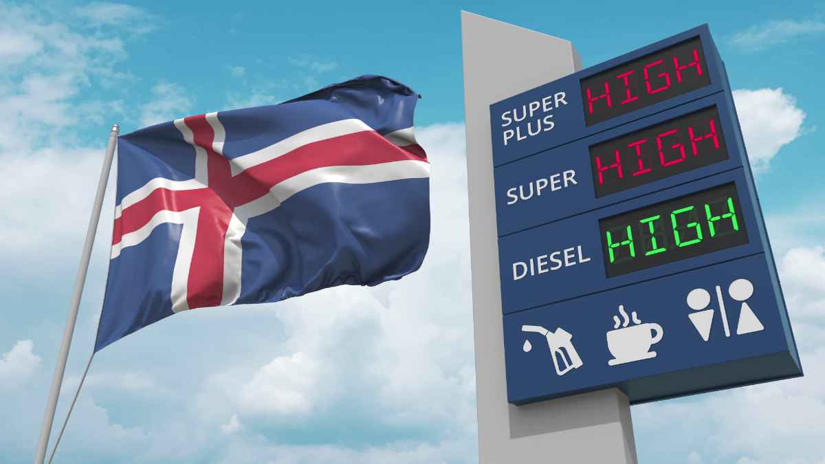 Fuel price board at Iceland gas station showing petrol and diesel costs during an Iceland road trip.